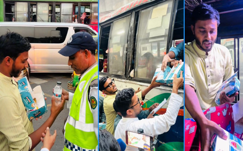 মানবিক উদ্যোগ : জ্যামে আটকে পড়া রোজাদারদের মাঝে ইফতার বিতরণ 